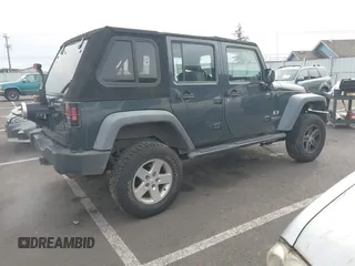 2008 Jeep Wrangler Unlimited X with VIN 1J4GB39138L518050, listed as a IAAI auction lot 41609541 with 226,752 mi miles and . Bid and sale history available at DreamBid. Image 4.