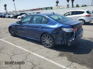 2018 BMW 5 Series 540i with VIN WBAJE5C51JWA94673, listed as a Copart auction lot 59807825 with 77,051 mi miles and Salvage title. Bid and sale history available at DreamBid. Image 2.
