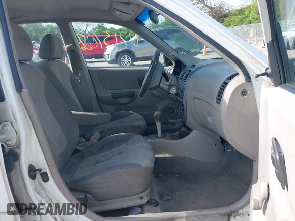 2002 Hyundai Accent GL with VIN KMHCG45C92U347708, listed as a IAAI auction lot 42137086 with 73,271 mi miles. Bid and sale history available at carsss.com. Image 5.