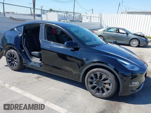 2022 Tesla Model Y Long Range with VIN 7SAYGDEE6NF480471, listed as a IAAI auction lot 41985797 with 82,777 mi miles and . Bid and sale history available at DreamBid. Image 1.