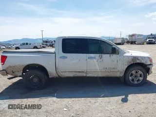 2007 Nissan Titan LE with VIN 1N6AA07B27N214751, listed as a IAAI auction lot 42325152 with 174,765 mi miles and . Bid and sale history available at DreamBid. Image 14.