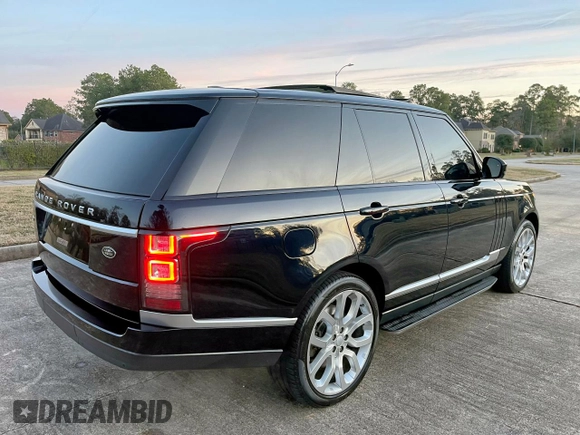 2014 Land Rover Range Rover Supercharged with VIN SALGS2TF6EA155229, listed as a Copart auction lot 57189225 with 95,369 mi miles and Salvage Title. Bid and sale history available at DreamBid. Image 4.