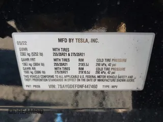 2022 Tesla Model Y Performance with VIN 7SAYGDEF0NF447460, listed as a IAAI auction lot 41670250 with 28,287 mi miles. Bid and sale history available at carsss.com. Image 9.