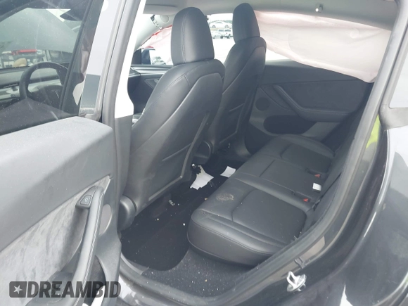 2024 Tesla Model Y z VIN 7SAYGDED3RF041788, wystawiony jako IAAI lot #42644453 z przebiegiem 22 189 mil mil oraz . Historia ofert i sprzedaży dostępna na DreamBid. Obrazek 8.