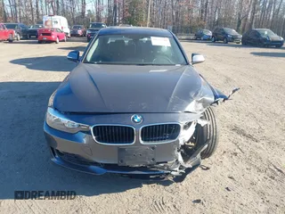 2015 BMW 3 Series 328i xDrive with VIN WBA3B5G5XFNS13908, listed as a IAAI auction lot 41638788 with 54,584 mi miles. Bid and sale history available at carsss.com. Image 12.