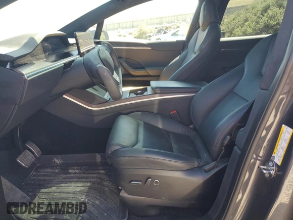 2023 Tesla Model X with VIN 7SAXCAE52PF380229, listed as a Copart auction lot 53535065 with 42,456 mi miles and Salvage Title. Bid and sale history available at DreamBid. Image 7.