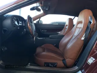 2007 Bentley Continental GT with VIN SCBDR33W77C047935, listed as a Copart auction lot 60557985 with 61,661 mi miles and Salvage title. Bid and sale history available at DreamBid. Image 7.