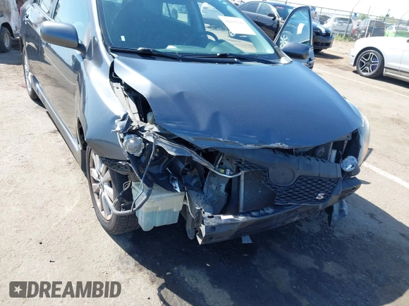 2009 Toyota Corolla with VIN 1NXBU40E69Z034459, listed as a IAAI auction lot 42095649 with 173,296 mi miles. Bid and sale history available at carsss.com. Image 6.