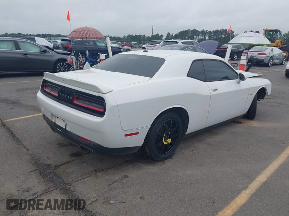 2015 Dodge Challenger R/T with VIN 2C3CDZAT2FH767808, listed as a IAAI auction lot 42437609 with 173,209 mi miles and . Bid and sale history available at DreamBid. Image 4.