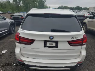 2017 BMW X5 xDrive35i with VIN 5UXKR0C56H0V68771, listed as a Copart auction lot 59587015 with 164,990 mi miles and Salvage title. Bid and sale history available at DreamBid. Image 6.