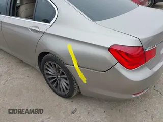 2012 BMW 7 Series 740i with VIN WBAKA4C51CC613670, listed as a IAAI auction lot 41582639 with 149,753 mi miles. Bid and sale history available at carsss.com. Image 12.