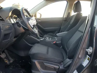 2016 Mazda CX-5 Sport with VIN JM3KE2BY9G0771969, listed as a Copart auction lot 80966064 with 99,348 mi miles and Salvage title. Bid and sale history available at DreamBid. Image 7.