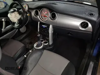 2007 MINI Convertible with VIN WMWRF33507TG16448, listed as a Copart auction lot 88474495 with 148,147 mi miles and Salvage Title. Bid and sale history available at DreamBid. Image 8.