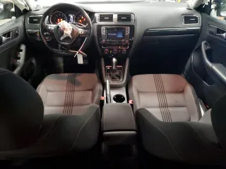 2017 Volkswagen Jetta 1.4T SE with VIN 3VWDB7AJ1HM387207, listed as a Copart auction lot 52557655 with 164,013 mi miles and Salvage Title. Bid and sale history available at carsss.com. Image 8.