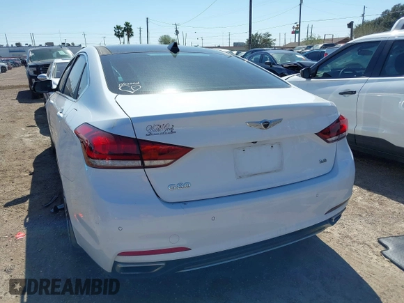 2018 Genesis G80 3.8L with VIN KMHGN4JE8JU227590, listed as a IAAI auction lot 41668042 with 69,914 mi miles. Bid and sale history available at carsss.com. Image 3.