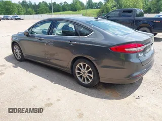 2017 Ford Fusion SE with VIN 3FA6P0HD7HR297945, listed as a IAAI auction lot 42015135 with 136,774 mi miles. Bid and sale history available at carsss.com. Image 3.