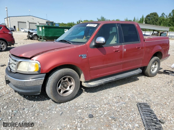 2001 Ford F-150 SuperCrew XLT with VIN 1FTRW07L91KE48149, listed as a Copart auction lot 70670704 with 0 mi miles and Salvage Title. Bid and sale history available at carsss.com. Image 1.