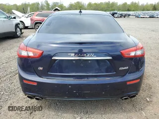 2015 Maserati Ghibli S Q4 z VIN ZAM57RTA1F1161983, wystawiony jako Copart lot #54793155 z przebiegiem 102 487 mil mil oraz Tytuł czysty. Historia ofert i sprzedaży dostępna na DreamBid. Obrazek 6.