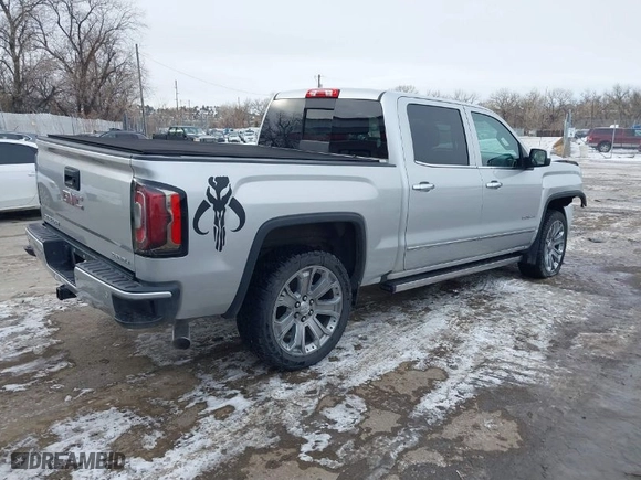 2018 GMC Sierra 1500 Denali with VIN 3GTU2PEJXJG472435, listed as a IAAI auction lot 41376821 with 63,177 mi miles. Bid and sale history available at carsss.com. Image 4.