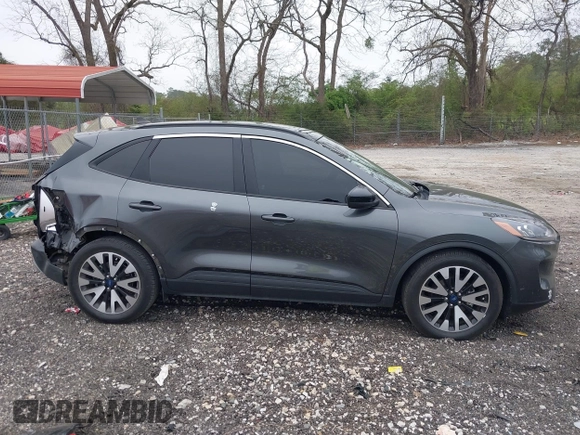 2020 Ford Escape SE Sport Hybrid with VIN 1FMCU0BZ7LUB13398, listed as a IAAI auction lot 41942498 with 118,604 mi miles and . Bid and sale history available at DreamBid. Image 14.