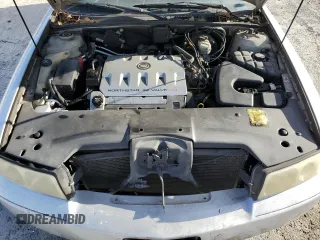 2003 Cadillac Seville Touring STS z VIN 1G6KY54923U101998, wystawiony jako Copart lot #74029304 z przebiegiem 134 157 mil mil oraz Szkoda całkowita • Salvage title. Historia ofert i sprzedaży dostępna na DreamBid. Obrazek 13.