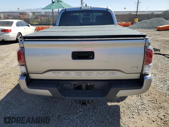 2021 Toyota Tacoma 4WD SR5 with VIN 3TMDZ5BN9MM099787, listed as a Copart auction lot 49717425 with 56,374 mi miles and Salvage Title. Bid and sale history available at carsss.com. Image 6.