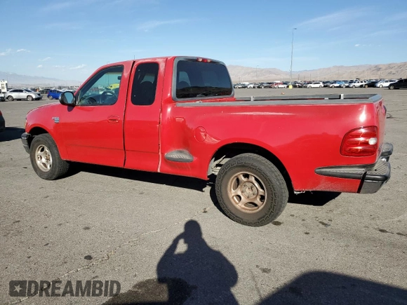 1999 Ford F-150 with VIN 1FTRX07W2XKC24186, listed as a Copart auction lot 74553294 with Not provided miles and Salvage title. Bid and sale history available at DreamBid. Image 2.