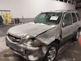 2003 Mazda Tribute DX with VIN 4F2YZ02B73KM43813, listed as a IAAI auction lot 41575708 with 202,214 mi miles and . Bid and sale history available at carsss.com. Image 17.