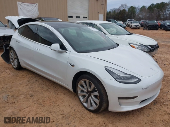 2020 Tesla Model 3 Standard Range Plus with VIN 5YJ3E1EA1LF738062, listed as a IAAI auction lot 41747581 with 41,897 mi miles. Bid and sale history available at carsss.com. Image 1.