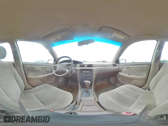 2000 Toyota Camry CE z VIN 4T1BG22K6YU991932, wystawiony jako Copart lot #55588155 z przebiegiem 188 363 mil mil oraz Szkoda całkowita • Salvage title. Historia ofert i sprzedaży dostępna na DreamBid. Obrazek 14.