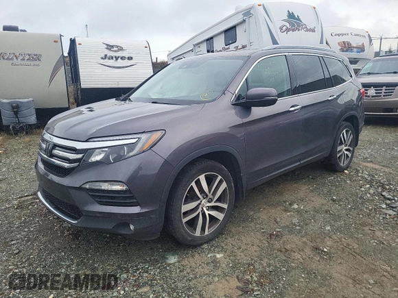 2018 Honda Pilot Touring z VIN 5FNYF6H93JB500695, wystawiony jako Copart lot #83302284 z przebiegiem 12 086 mil mil oraz Szkoda całkowita • Salvage title. Historia ofert i sprzedaży dostępna na DreamBid. Obrazek 1.