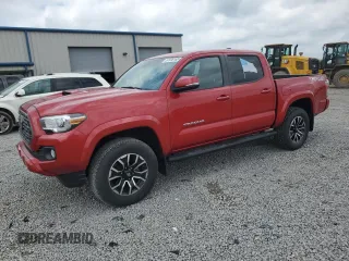 2020 Toyota Tacoma SR5 z VIN 3TMCZ5AN1LM301291, wystawiony jako Copart lot #57338165 z przebiegiem 76 121 mil mil oraz Szkoda całkowita • Salvage title. Historia ofert i sprzedaży dostępna na DreamBid. Obrazek 1.