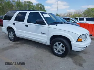 2001 Oldsmobile Bravada z VIN 1GHDT13W612113305, wystawiony jako IAAI lot #42007883 z przebiegiem 117 627 mil mil oraz . Historia ofert i sprzedaży dostępna na DreamBid. Obrazek 1.