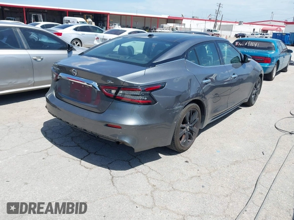 2020 Nissan Maxima SL with VIN 1N4AA6DVXLC373467, listed as a IAAI auction lot 42784055 with 221,014 mi miles and . Bid and sale history available at DreamBid. Image 4.