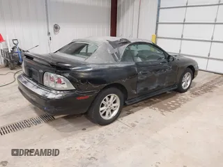 1998 Ford Mustang GT with VIN 1FAFP45X5WF249652, listed as a IAAI auction lot 41830267 with 210,192 mi miles. Bid and sale history available at carsss.com. Image 4.