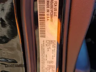 2023 Dodge Durango GT z VIN 1C4RDJDG1PC584491, wystawiony jako Copart lot #79817334 z przebiegiem 19 588 mil mil oraz Szkoda całkowita • Salvage title. Historia ofert i sprzedaży dostępna na DreamBid. Obrazek 13.
