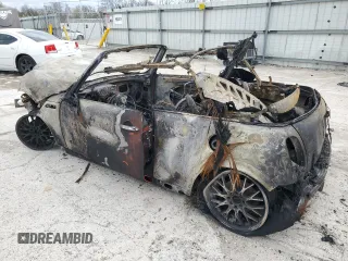 2006 MINI Convertible S with VIN WMWRH33536TK59031, listed as a Copart auction lot 51598825 with Not provided miles and Salvage title. Bid and sale history available at DreamBid. Image 2.