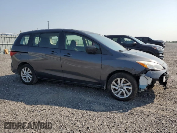 2013 Mazda 5 Touring with VIN JM1CW2CL5D0152715, listed as a Copart auction lot 71315534 with 219,315 mi miles and Salvage Title. Bid and sale history available at DreamBid. Image 4.