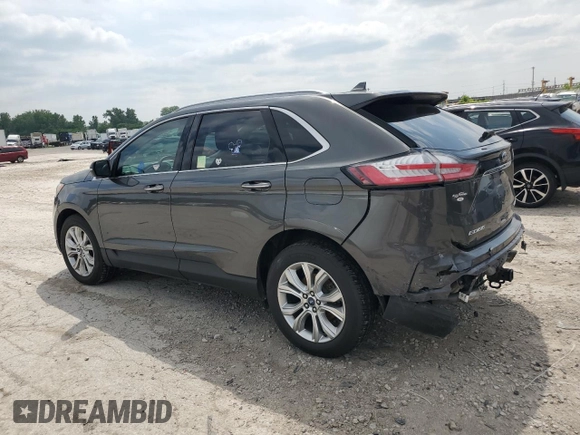 2020 Ford Edge Titanium с VIN 2FMPK4K97LBA11619, выставлен на аукционе Copart как лот 59505825 с пробегом 87 506 миль миль и Списание • Salvage title. История ставок и продаж доступна на DreamBid. Изображение 2.
