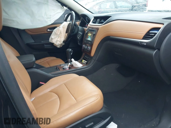 2013 Chevrolet Traverse LT with VIN 1GNKVJKD9DJ124307, listed as a IAAI auction lot 41864010 with 123,458 mi miles and . Bid and sale history available at DreamBid. Image 5.