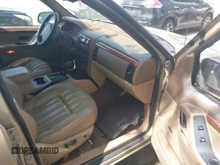 1999 Jeep Grand Cherokee Limited with VIN 1J4GW68S3XC580949, listed as a IAAI auction lot 42502949 with 150,520 mi miles and . Bid and sale history available at DreamBid. Image 5.