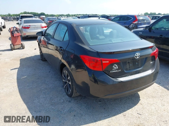 2017 Toyota Corolla L with VIN 5YFBURHE9HP731223, listed as a IAAI auction lot 42381802 with 86,954 mi miles and . Bid and sale history available at DreamBid. Image 3.