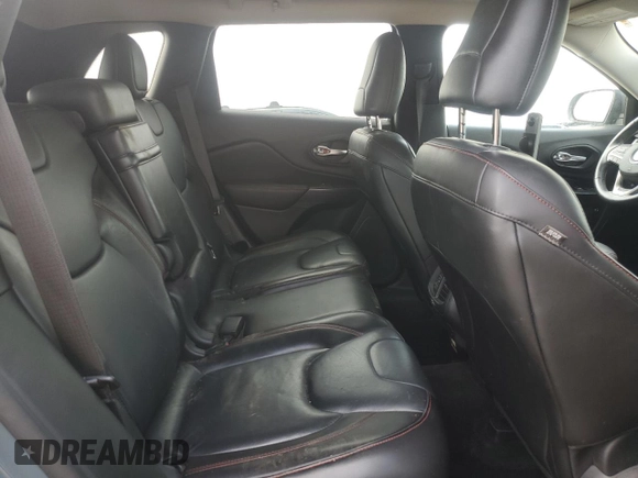 2015 Jeep Cherokee Trailhawk with VIN 1C4PJMBB1FW630715, listed as a Copart auction lot 58559675 with 58,302 mi miles and Salvage title. Bid and sale history available at DreamBid. Image 10.