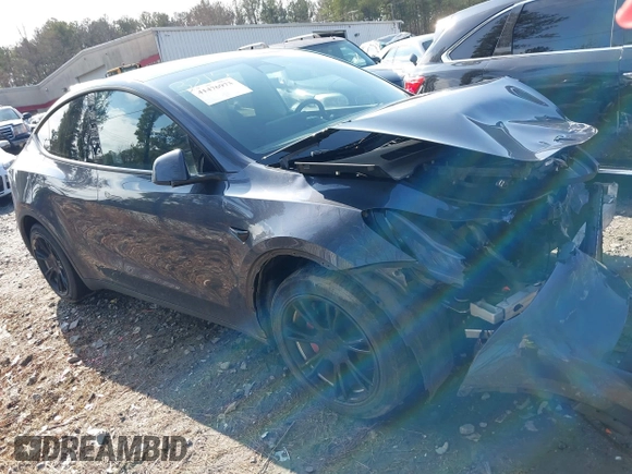 2023 Tesla Model Y Long Range with VIN 7SAYGDEE1PA053215, listed as a IAAI auction lot 41476973 with 58,025 mi miles and . Bid and sale history available at DreamBid. Image 12.