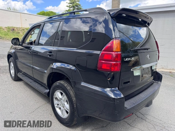 2005 Lexus GX 470 with VIN JTJBT20X050079831, listed as a Copart auction lot 56405105 with 390,415 mi miles and Clean Title. Bid and sale history available at DreamBid. Image 3.