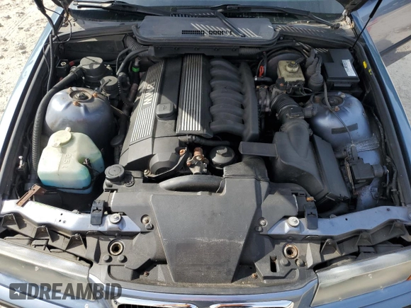 1999 BMW 3 Series 323i с VIN WBABJ8339XEM25396, выставлен на аукционе Copart как лот 58027715 с пробегом 145 503 миль миль и Чистый • Clean title. История ставок и продаж доступна на DreamBid. Изображение 11.
