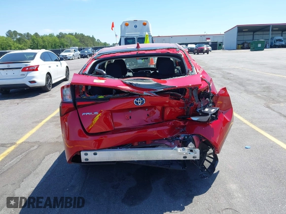 2022 Toyota Prius L Eco with VIN JTDKAMFU6N3158307, listed as a IAAI auction lot 42042768 with 17,882 mi miles and . Bid and sale history available at DreamBid. Image 16.