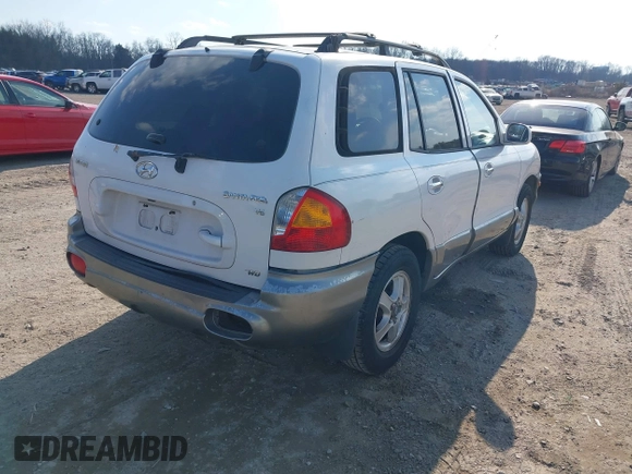 2002 Hyundai Santa Fe GLS with VIN KM8SC73D32U249942, listed as a IAAI auction lot 41660482 with 151,164 mi miles. Bid and sale history available at carsss.com. Image 4.