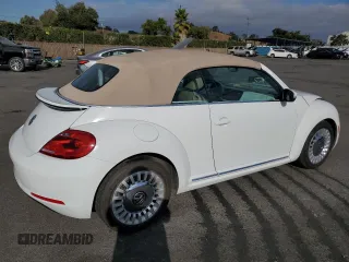 2015 Volkswagen Beetle 1.8T with VIN 3VW517AT6FM802771, listed as a Copart auction lot 72225834 with 128,946 mi miles and Salvage title. Bid and sale history available at DreamBid. Image 3.