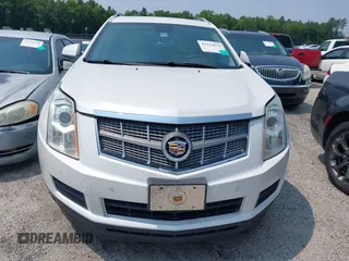 2011 Cadillac SRX Luxury Collection z VIN 3GYFNAEY2BS527043, wystawiony jako IAAI lot #42234641 z przebiegiem 114 769 mil mil oraz . Historia ofert i sprzedaży dostępna na DreamBid. Obrazek 6.